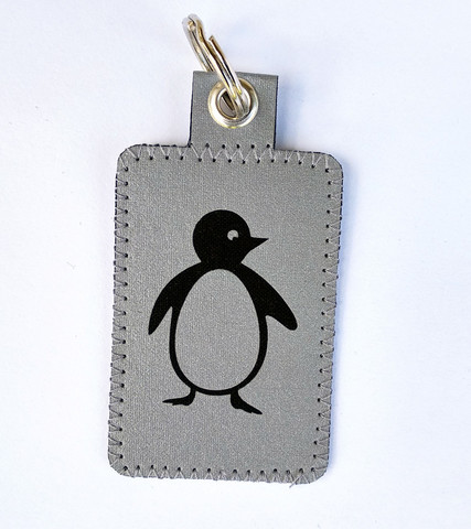 HEIJASTAVA VETOKETJUNVEDIN PINGVIINI