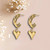 FRENCH RIVIERA|Modern Heart Earrings -kirurginteräsrenkaat sydämellä