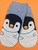 Iloinen pingviini sukat