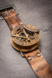 Wrist sundial with compass