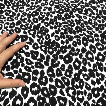 Luomupuuvillatrikoo: Leopard, musta - valkoinen