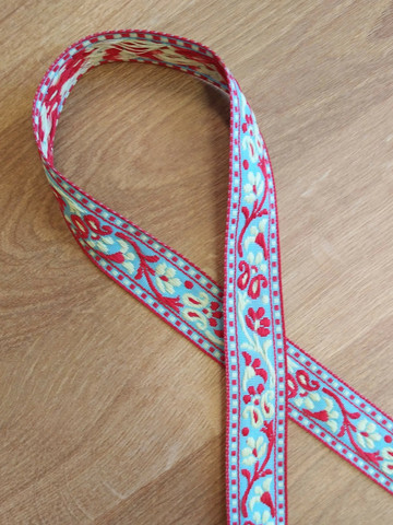 Vävt band 20 mm, blomranka, röd/gul/ljus turkos