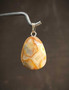 Crazy Lace Agate Riipus Rumpuhiottu