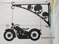 Gate sign and rack Motorbike old