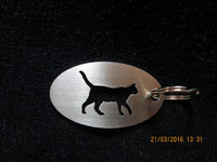 Keychain oval cat walks short-haired