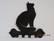Coat rack cat sitting long-haired