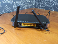 ADSL2 -moodeemi/reititin (Netgear DGN2000)