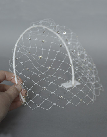 Birdcage huntu strasseilla pannassa, ivory