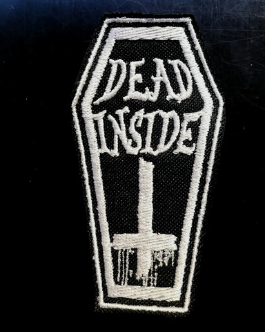 Dead inside coffin patch, black