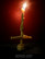 Inverted cross beeswax candle