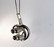 Modernist silver pendant with rock crystals