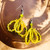 keltaiset helmipunos korvakorut