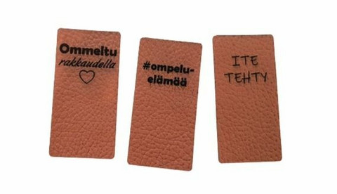 Ompeluaiheiset tekonahkamerkit