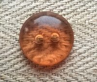 Oranssinsävyinen läpinäkyvä nappi, 15 mm