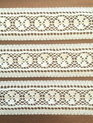 Valkoinen välipitsi, leveys 50 mm, puuvillaa