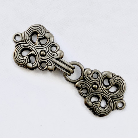 Koristehakanen, tumma hopea, 62 x 22 mm