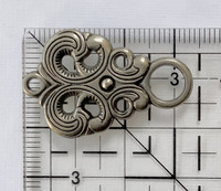 Koristehakanen, tumma hopea, 62 x 22 mm