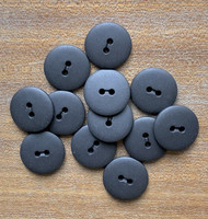 Musta nappi, mattapintainen, 23 mm