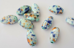 Keramiikkahelmi turkoosi/valkoinen/oranssi ovaali 20 x 10 mm (10 kpl/pss)