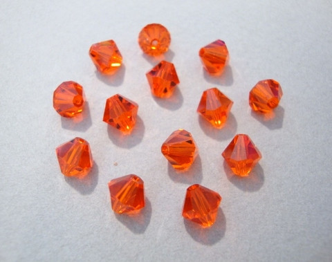 Swarovski kristallihelmi oranssi bicone 6 mm (4/pss)