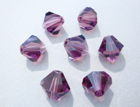 Swarovski kristallihelmi ametisti bicone 10 mm (4/pss)