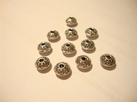 Metallihelmi bicone/hyrrä antiikkipatina n. 4 x 7 mm (10 kpl/pss)
