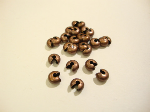 Kuparinvärinen suojahelmi/päällyshelmi 2-2,5 mm:n  kiinnityshelmelle (25 kpl/pss)