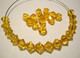Swarovski kristallihelmi auringonkukan keltainen bicone 6 mm (4/pss)