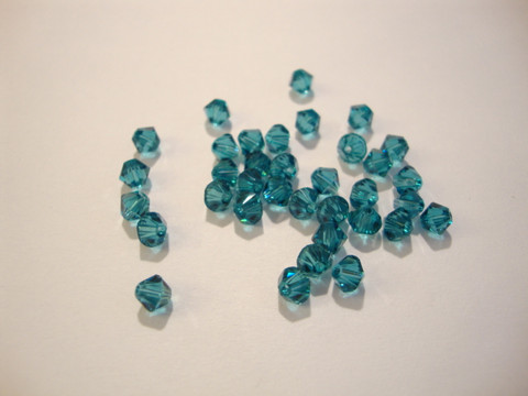 Swarovski kristallihelmi Indicolite turkoosi/vihreä bicone 4 mm (5/pss)