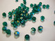 Swarovski kristallihelmi smaragdin vihreä AB pyöreä 6 mm (4/pss)