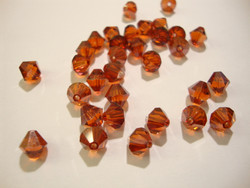 Swarovski kristallihelmi punainen Red Magma bicone 6 mm (4/pss)