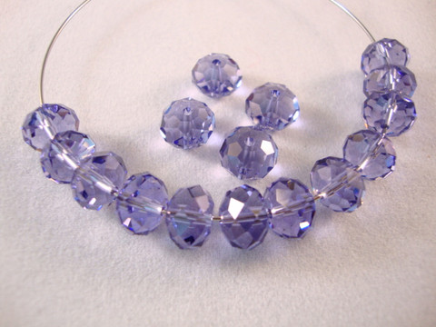 Swarovski kristallihelmi violetti (Tanzanite) rondelli 6 x 8 mm (6/pss)