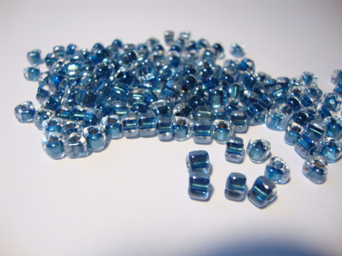 Miyuki siemenhelmi kolmio 4x4x3 mm kirkas-tumma (denim)sininen sisus TR1115 (10 g/pss)