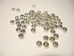 Metallihelmi/välihelmi uritettu hopeoitu 4,5 x 2,5 mm (100 kpl/pss)