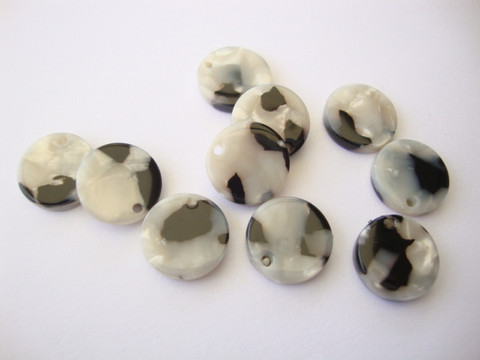 Riipus hartsi musta/valkoinen pyöreä 12 mm, reikä n. 1,3 mm (2 kpl/pss)