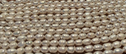 Makeanvedenhelmi valkoinen soikea 6x8 mm (n. 40 helmeä/nauha)