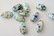 Keramiikkahelmi turkoosi/valkoinen/oranssi ovaali 20 x 10 mm (10 kpl/pss)