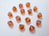 Swarovski kristallihelmi tumma oranssi/terracotta  bicone 6 mm (4/pss)