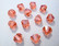 Swarovski kristallihelmi punainen (Padparadscha) bicone 8 mm (4/pss)
