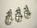 Riipus hopeanvärinen lumiukko 25 x 13 mm