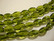 Tsekkiläinen lasihelmi oliivin vihreä ovaali kierretty 13 x 9 mm (32 kpl/nauha)