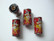 A Puuhelmi Vintage punainen putki 30 x 16 mm