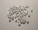 KK Metallihelmi hopeoitu sileä pyöreä 2 mm (500/pss)