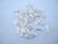 Metallihelmi hopeoitu putki kaareva 10 x 2 mm (30 kpl/pss)