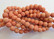 Kivihelmi Laavakivi oranssi pyöreä 8 mm (n. 48 kpl/nauha)