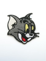 Tom-kangasmerkki