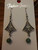 Earrings with green stone beads