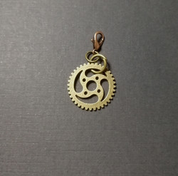 Gear collar charm