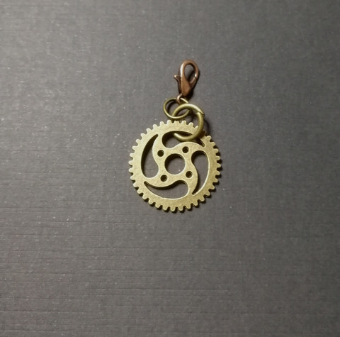 Gear collar charm