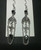 Hanging earrings with crosses, beads and chains